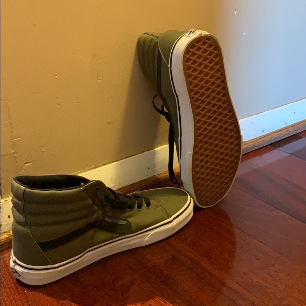 Black and green high top vans